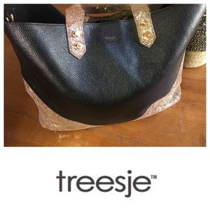 Treesje black purse with metallic gold edges